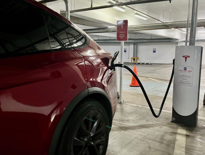 SUT-L-TESLA-CHARGING-0625-01
