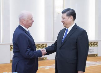 习近平会见世界经济论坛主席施瓦布