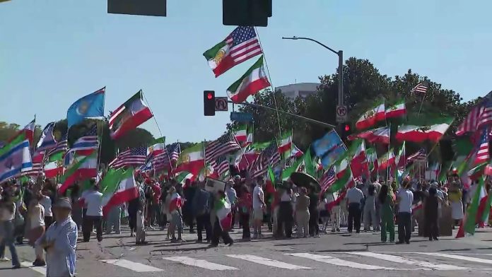 79c0a6ed4ad0c1b1ce595d82d6b981b1_iran-protest_strip=1